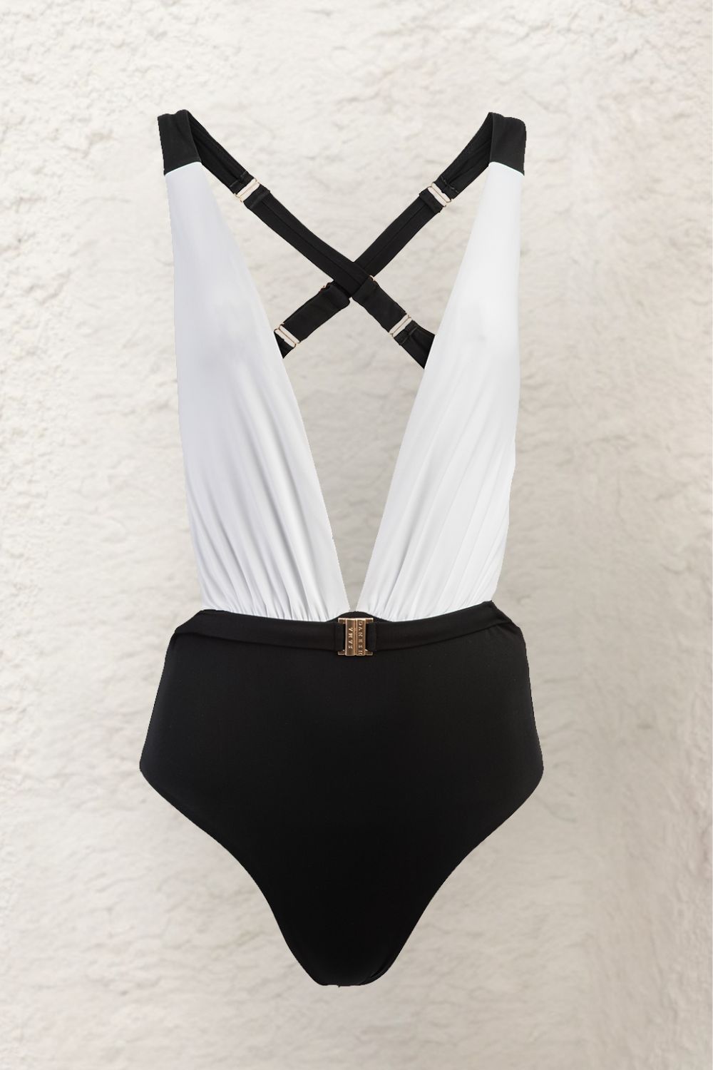 Front view of a cut out swimsuit in Monochrome  colours that accentuates the waist