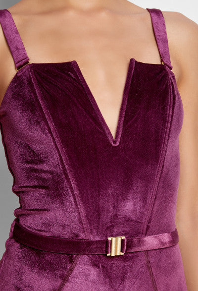 Close-up of the Purple Velvet Victory One-Piece Swimsuit, highlighting the soft corset boning, luxurious velvet texture, and 24k gold-plated hardware.